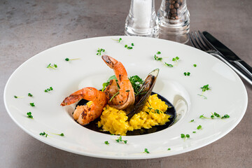 Risotto with seafood: rice, shrimp and mussels