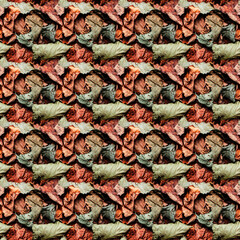 Seamless brown and red autumn leaves colored camouflage photo pattern.