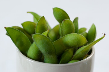 Edamame, soy in shell in glass cup