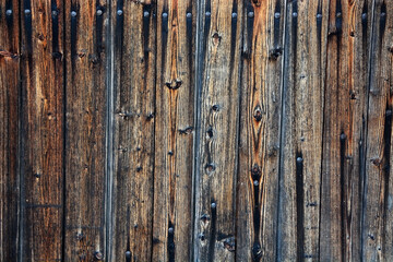 Background from old wooden boards (wooden beam). Vintage texture, background. Gray (Black) color