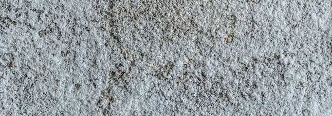 rough white concrete surface background. old plaster. cracks on the wall