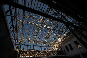 Fototapeta premium old abandoned building. Old stairs of an abandoned house. old room interior