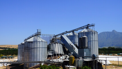 Fototapeta na wymiar Collapsed grain silos in the field