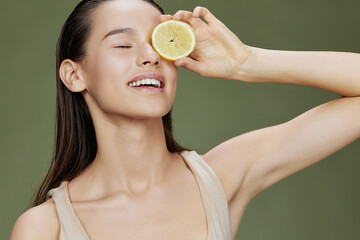young woman lemon vitamins health cosmetology isolated background