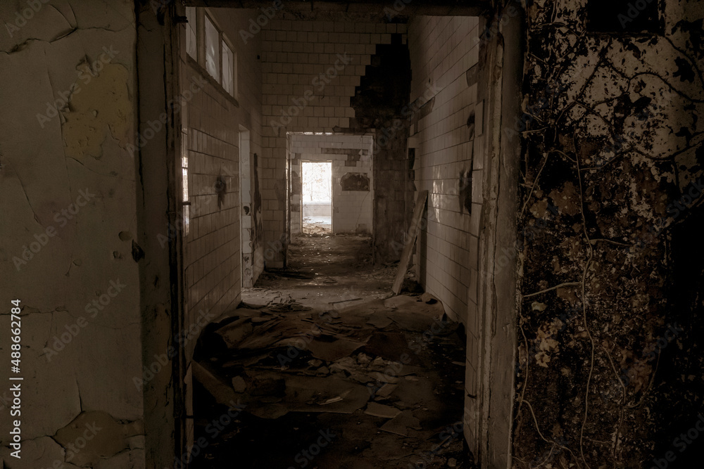 Wall mural war. building after the bombing. destroyed building. old abandoned building. Old stairs of an abandoned house. old room interior