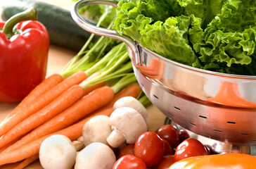 Salad vegetables with a silver colander