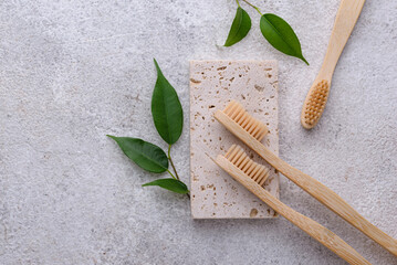 Fototapeta na wymiar Bamboo toothbrush, zero waste care products