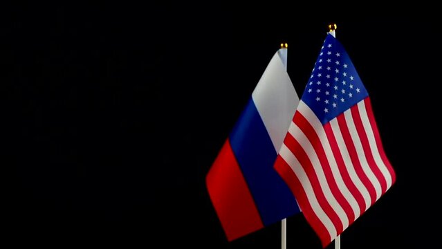 USA and Russia flag. Conflict, diplomatic relations. The concept of sanctions pressure in politics. World crisis, war. Black background photo