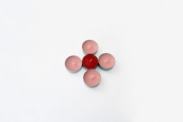 Round  colored candles isolated on white.