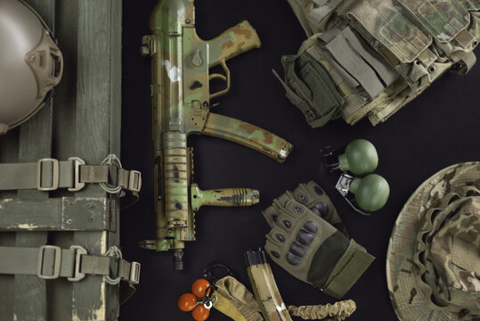 Military Ammunition Top View Of A Grenade Box, Rifle, Grenades, Bulletproof Vest, Helmet And Other Tactical Items