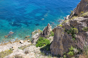 Beach day in the paradise. Aerial views over the cliffs of Raco del Corb in Mascarat, Altea, Spain