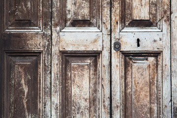 Details of ancient wooden doors of central Italy