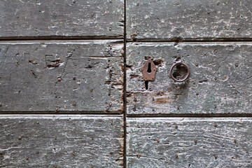 Details of ancient wooden doors of central Italy