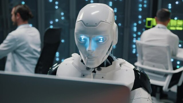 Futuristic robot typing computer keyboard cloud computing webhosting checking server system data working with people. Telecommunications. Future AI.