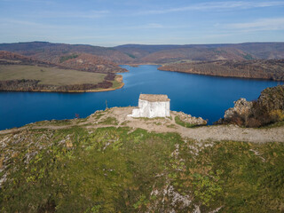 Fototapeta na wymiar Church of Saint John the Baptist and Pchelina Reservoir, Bulgaria