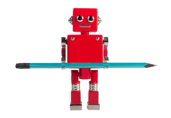 Isolated photo of red colored metal miniature robot toy standing with sharpened pencil on white...