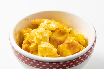 Small scrambled eggs on a monochrome background