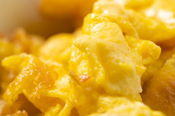Small scrambled eggs on a monochrome background