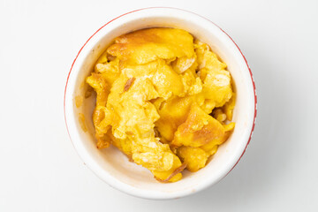 Small scrambled eggs on a monochrome background