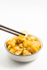 Pickled mustard greens on a monochrome background