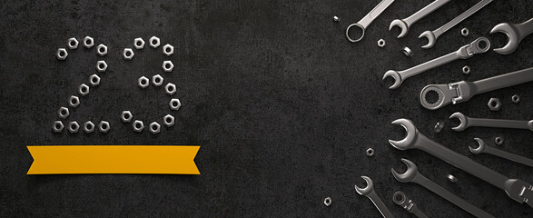 23 made of nut bolts and surrounded by wrenches. Creative template for the February 23 (Fatherland Defender Day) greeting card or banner. 