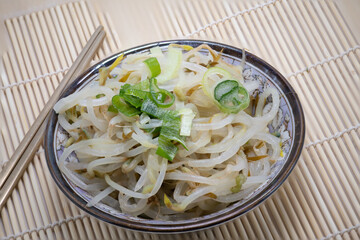 Herbs eaten with sprouts of Korean cuisine mung beans on a white background
