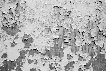 Cracked old paint on metal surface background black and white