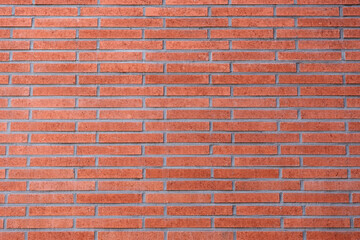 Obraz premium red bricks on the wall of the house