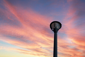 Mercury street lamp on sunset sunny weather background