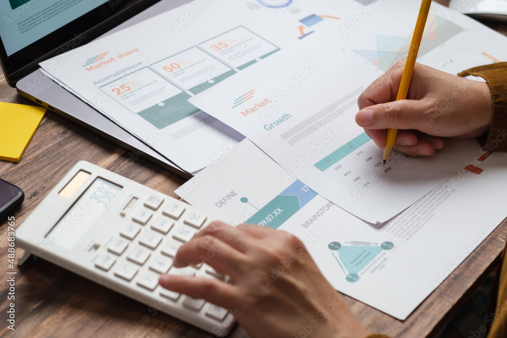 Poster close up hand using calculator calculate tax and budget of project at home