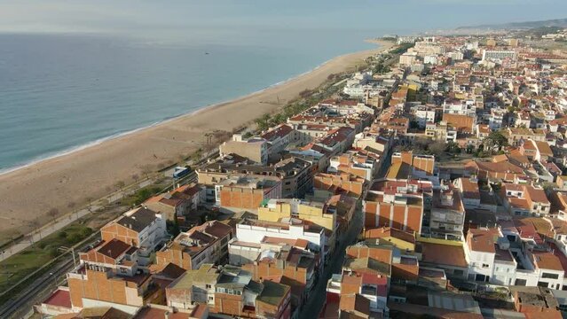 Aerial drone view of Malgrat de Mar city in Spain Maresme tourist town beach views Santa Susana Pineda province of Barcelona