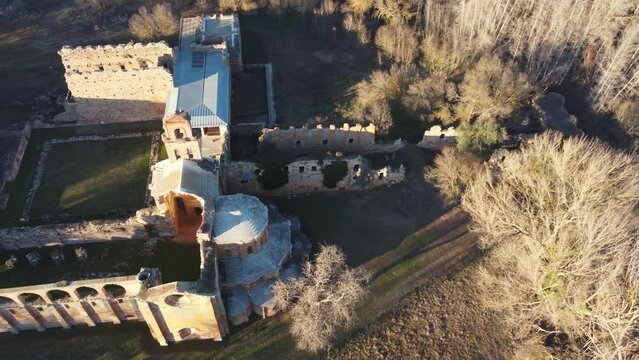 Aerial overhead view of ruined stone monastery in Moreruela, Zamora, Spain. XII-XIII century buiding of the christian monastic cluny order. Camera getting close.
