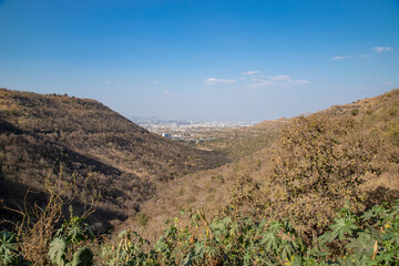 Fototapeta na wymiar View of Pune Cityscape from top of hill mountain Pune, Maharashtra, India