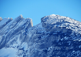 Fototapeta na wymiar Snow-capped alpine peak Gulmen (or Gulme, 1998 m) in Alpstein mountain range and in Appenzell Alps massif, Alt St. Johann - Canton of St. Gallen, Switzerland (Schweiz)