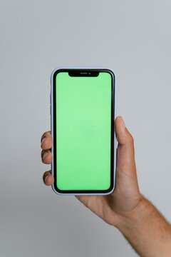 Smartphone similar with blank white green screen for Infographic Global Business Marketing Plan, mockup model similar to Phone isolated Background of investment economy.