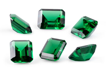 set of raw emeralds, gemstone jewelry isolated on white background