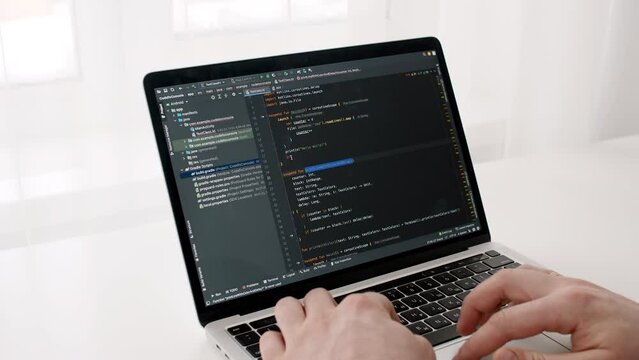 Coding on the screen, HTML encoding and programming on a laptop screen, developer, web development. Computer Web Developer. Cloud data social network media or virus. High quality 4k footage