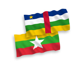 National vector fabric wave flags of Central African Republic and Myanmar isolated on white background. 1 to 2 proportion.