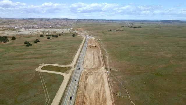 Aerial view over a freeway in California with a expansion construction project been developed
