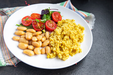 couscous with beans and salad tomato vegetables fresh portion healthy meal food diet snack on the...
