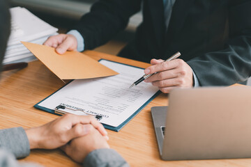 Businesswoman and Male lawyer or judge consult having team meeting with client, Law and Legal services concept.