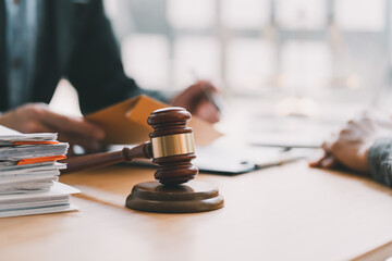 Male lawyer or judge consult having team meeting with Businesswoman client, Law and Legal services...