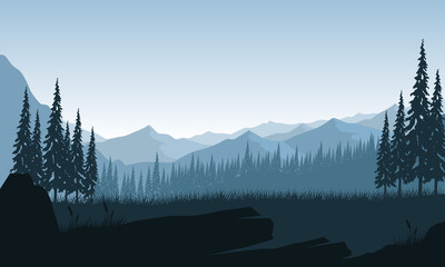 Beautiful view of mountains with the silhouette of pine trees in the morning from the edge of the forest