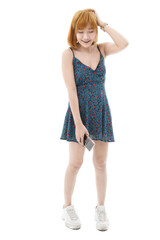 Isolated cutout studio full body shot of Asian young sexy blonde short hair female fashion model in camisole dress and sneakers standing look at camera on white background