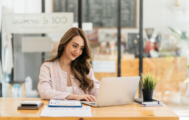 Business, finance and employment, female successful entrepreneurs concept. Confident smiling asian businesswoman, office worker in suit using laptop, help clients.