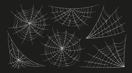 Scary spider webs. White cobweb silhouette isolated on black background. Set of doodle spidewebs. Hand drawn cob webs for Halloween party. Vector illustration.