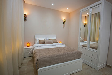 Fototapeta na wymiar Interior design of double bedroom in house