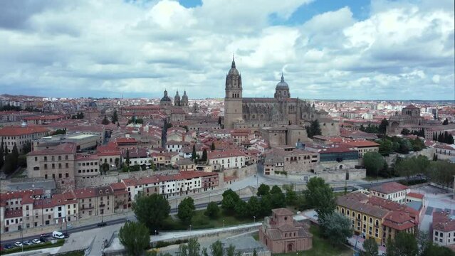Cloudy day over Salamanca, Castilla y Le&oacute;n, Spain. Thic dark clouds, blue sky, sad day over gothic cathedral.