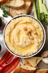 Concept of tasty food with hummus, top view