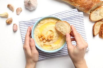 Concept of tasty food with hummus, top view